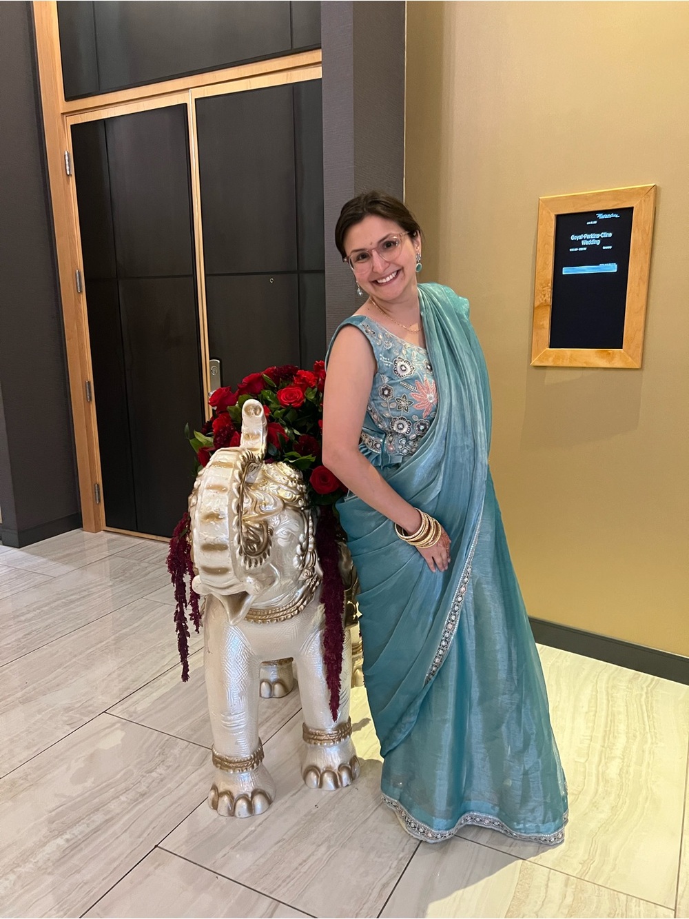 Embroidered Teal Saree with Floral Blouse